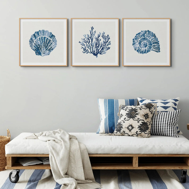 Scallop Shell Art Print, featuring stunning watercolour shell art painting. This beautiful piece is elegantly framed in a natural wood frame to enhance its aesthetic appeal. Perfect for adding a touch of coastal charm to any space.