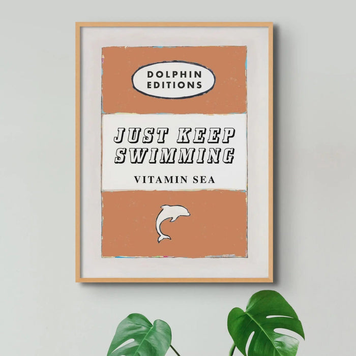 "Just Keep Swimming" vintage book cover art print in orange, which comes already framed. Beach House Art