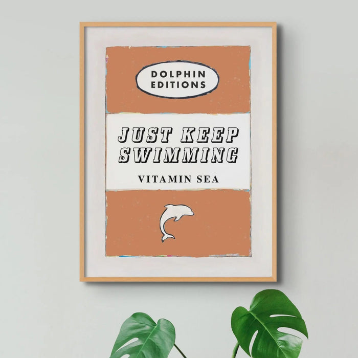 Vintage Book Cover Art Print titled "Just Keep Swimming" in Orange colour. It is available in an unframed 