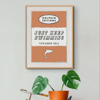 Vintage Book Cover Art Print titled "Just Keep Swimming" in Orange colour. It is available in an unframed 