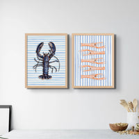 set of two kitchen wall art prints of shellfish paintings above kitchen sideboard - beach house art