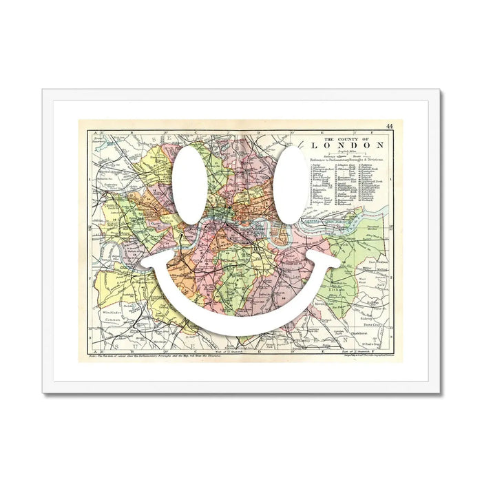 vintage map of London with a white smiley face on it in a white frame - beach house art