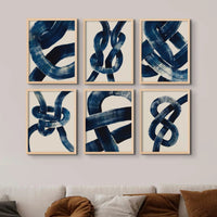 Framed abstract art print of a nautical knot in blue - coastal wall art