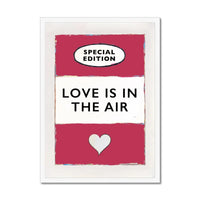 framed print of the Vintage Book Cover for "Love is in the Air" song lyric art print in red (Viva Magenta) - Framed Wall Art