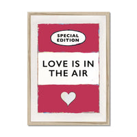 framed print of the Vintage Book Cover for "Love is in the Air" song lyric art print in red (Viva Magenta) - Framed Wall Art