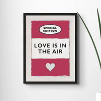 framed print of the Vintage Book Cover for "Love is in the Air" song lyric art print in red (Viva Magenta) - Framed Wall Art