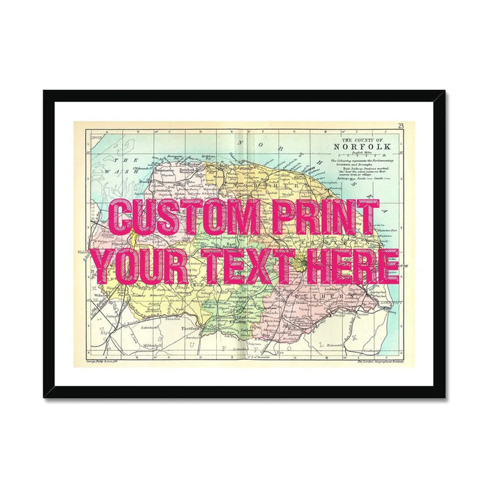 A framed personalised Norfolk map print with a pink typographic custom text overlay in a black frame.