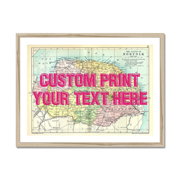 Coastal wall art featuring a personalised vintage map print of Norfolk with pink font - framed wall art