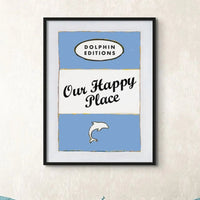 Our Happy Place quote print on vintage style book cover in blue - Framed