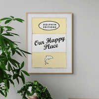 Our Happy Place quote print on vintage style book cover in Yellow - Framed