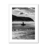 black & white photograph of a surfer on the beach in a white frame- beach house art